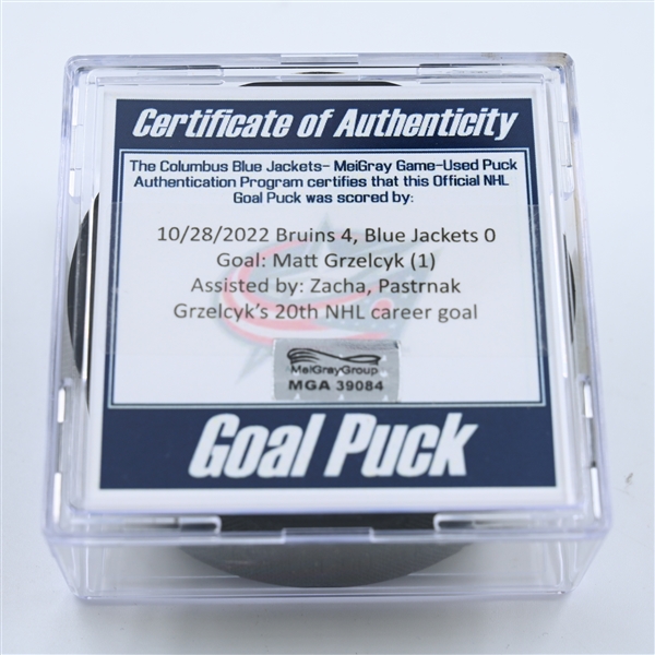 Matt Grzelcyk - Boston Bruins - Goal Puck - October 28, 2022 vs. Columbus Blue Jackets (Blue Jackets Logo)  - 2022-23 NHL Season