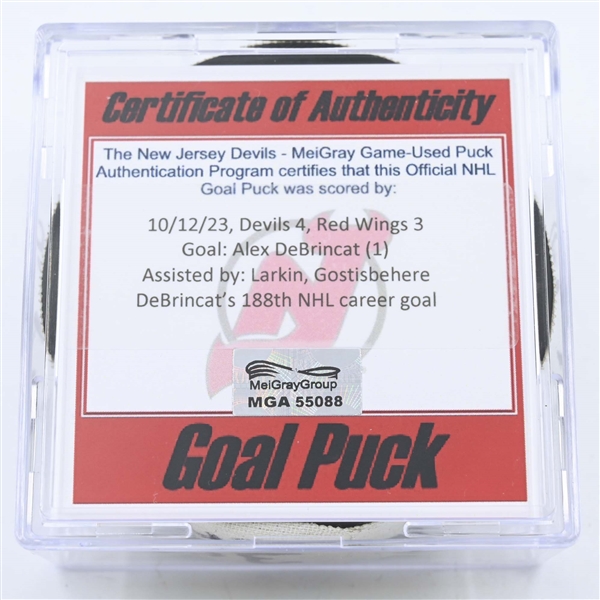 Alex DeBrincat - Detroit Red Wings - Goal Puck - October 12, 2023 vs. New Jersey Devils (Devils Logo)