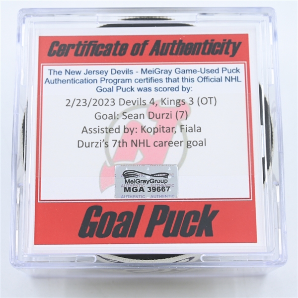 Sean Durzi - Los Angeles Kings - Goal Puck - February 23, 2023 vs. New Jersey Devils (Devils 40th Anniversary Logo)