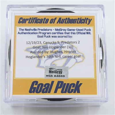 Nils Hoglander - Vancouver Canucks - Goal Puck - December 19, 2023 vs. Nashville Predators (Predators 25th Anniversary Logo)