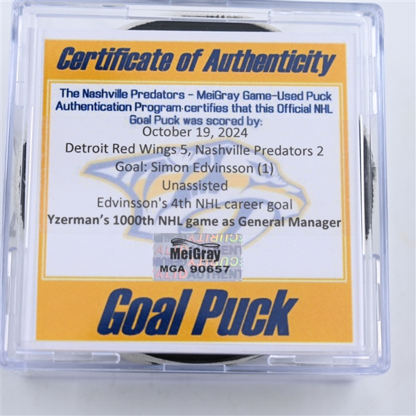 Simon Edvinsson - Detroit Red Wings - Goal Puck - October 19, 2024 vs. Nashville Predators (Predators Logo)