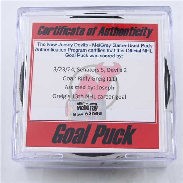 Ridly Greig - Ottawa Senators - Goal Puck - March 23, 2024 vs. New Jersey Devils (Devils Logo)