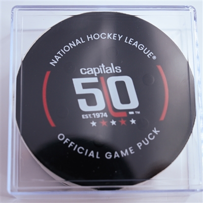 Justin Brazeau - Boston Bruins - Goal Puck - December 31, 2024 vs. Washington Capitals (Capitals' 50th Anniversary Logo)