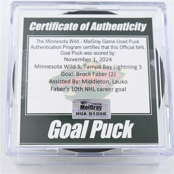 Brock Faber - Minnesota Wild - Goal Puck - November  1, 2024 vs. Tampa Bay Lightning (Wild Logo)