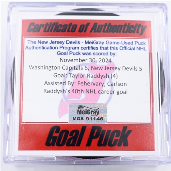 Taylor Raddysh - Washington Capitals - Goal Puck - November 30, 2024 vs. New Jersey Devils (Devils Logo)